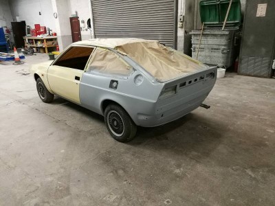 Primer applied: nearside and rear panel and valance.