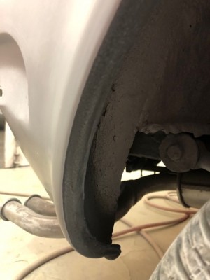 Rear wheel arches receive stoneguard before final paint