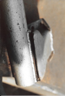 Had a struggle with the cars handling in qualifying at Mallory Park, kept wanting to leave the circuit at Gerrards bend.  Managed to creep round for three laps and qualified last on the grid.  Finally found what the problem was, the welding had sheared on the front strut.  Nigel Cottee, ever the gentleman, offered to weld it up for me if we could get it back to his garage quickly.  Fortunately I had towed the car to the circuit with my GTV6.  So we pulled the strut off and belted up the M1 to Nigel's place in Nottingham, no speed cameras in those days.  We got back to the circuit in time for us to put the car back together and get out on the grid.  I was hyper pumped up and went from the back of the grid passing a lot of cars on the grass when the flag dropped and eventually got into 2nd place but couldn't quite catch Nick Sismey in the lead.  Nick said afterwards, that he was cruising and only realised I was closing him down because I'd got my headlights on. Doh!