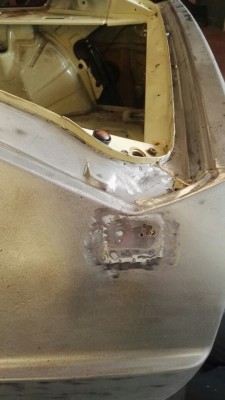 Previous 'repair' to one side of the tailgate aperture...